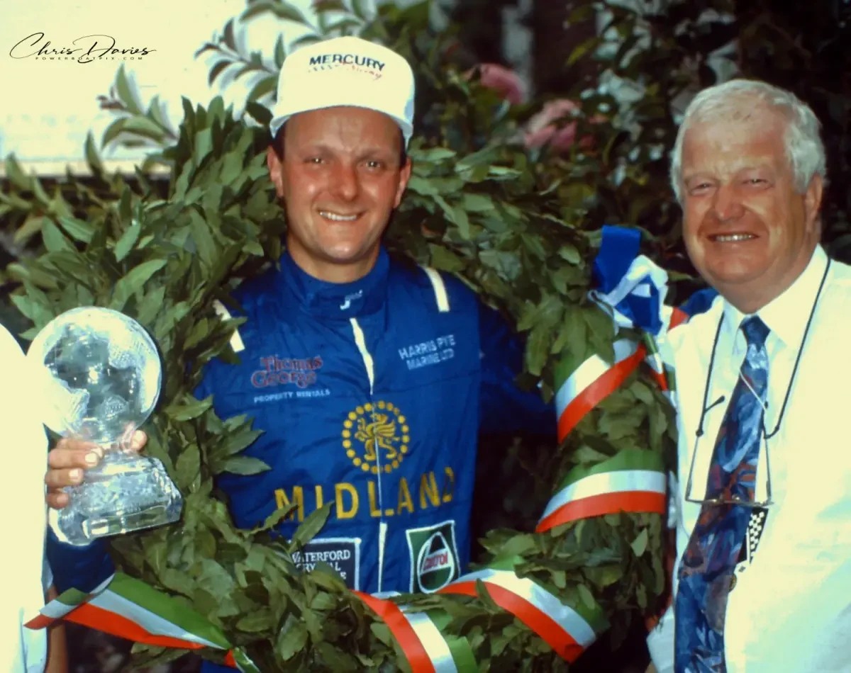 David Parkinson and Jon Jones on a podium by Lake Como in 1993